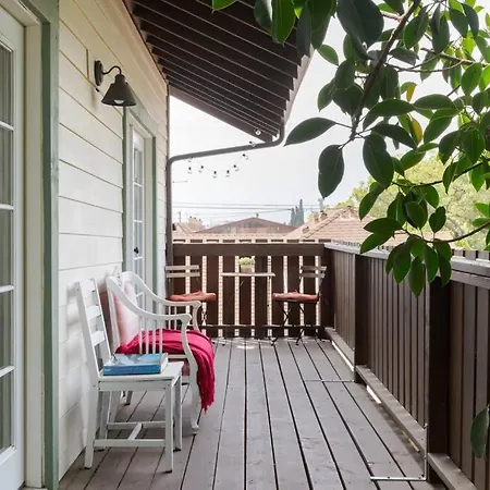 Take It Easy On The Porch In A Hollywood Hideaway Vila